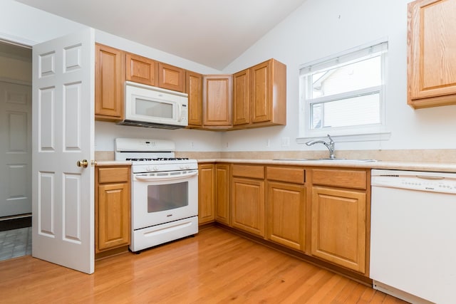 4351 Knollcrest Dr, Ann Arbor, MI 48108 - kitchen with white appliances, light countertops, light wood-type flooring, and lofted ceiling