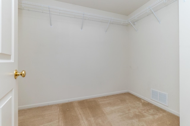 4351 Knollcrest Dr, Ann Arbor, MI 48108 - walk in closet featuring light colored carpet