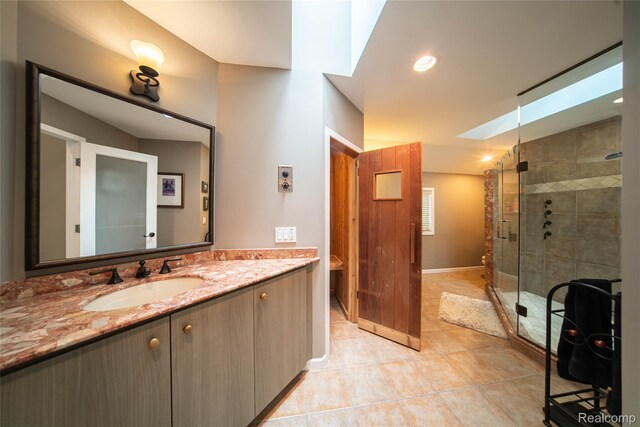 4683 Maura Ln, West Bloomfield, MI 48323 - full bath featuring vanity, tile patterned floors, a stall shower, and a skylight