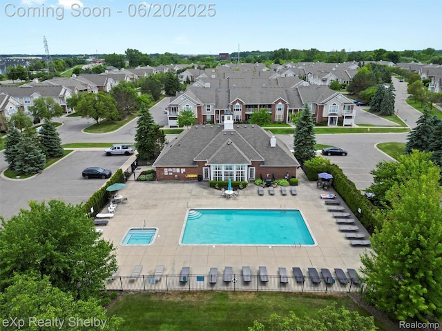 16436 Grandview Dr, Macomb, MI 48044 - community pool with a residential view and a patio