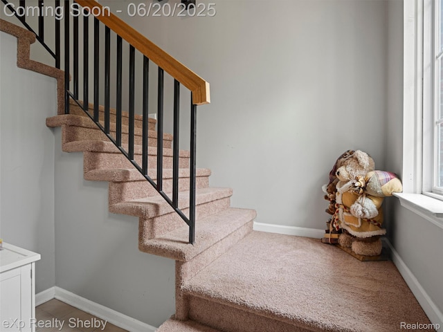16436 Grandview Dr, Macomb, MI 48044 - stairs featuring baseboards