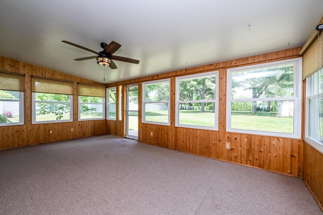 2729 Horton Ct, Niles, MI 49120 - unfurnished sunroom featuring carpet, wood walls, and lofted ceiling