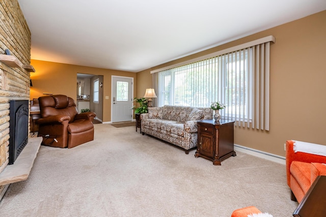 2729 Horton Ct, Niles, MI 49120 - living area featuring a fireplace, light colored carpet, and baseboard heating