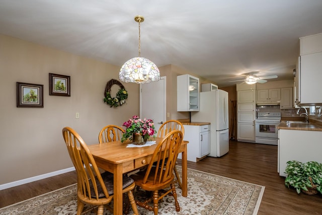 2729 Horton Ct, Niles, MI 49120 - dining room with ceiling fan and dark wood-style floors