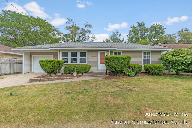 4516 Burgis Ave SE, Grand Rapids, MI 49508 - view of front of house featuring a garage and driveway