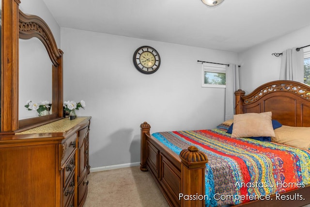 4516 Burgis Ave SE, Grand Rapids, MI 49508 - bedroom with light carpet and baseboards