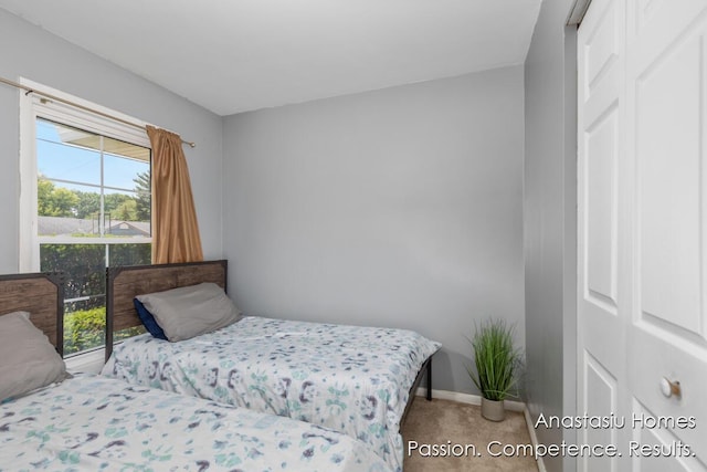 4516 Burgis Ave SE, Grand Rapids, MI 49508 - carpeted bedroom with baseboards