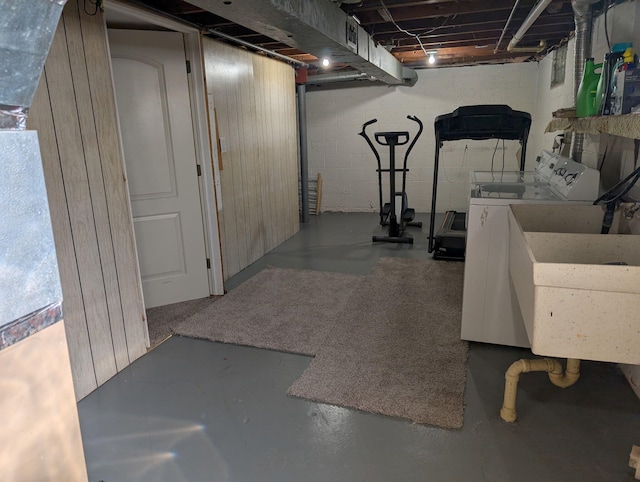 4516 Burgis Ave SE, Grand Rapids, MI 49508 - below grade area with washer and clothes dryer and concrete block wall