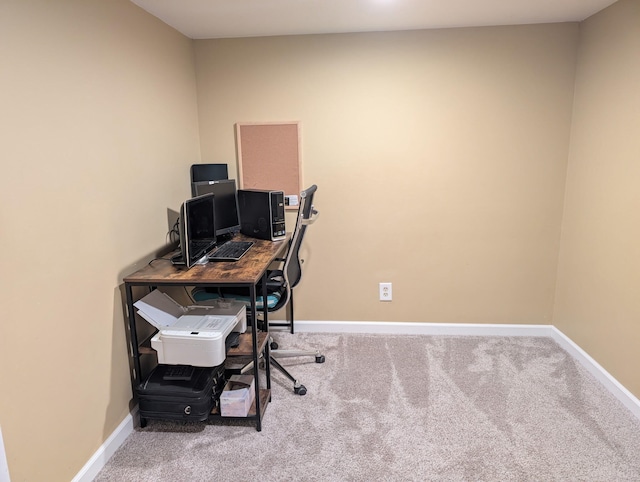 4516 Burgis Ave SE, Grand Rapids, MI 49508 - carpeted home office featuring baseboards