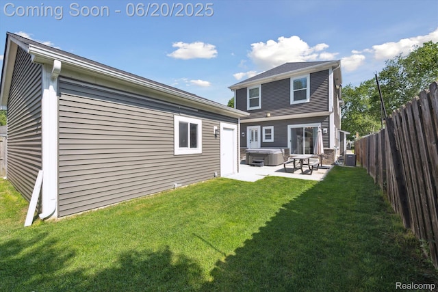 1920 Rowland Ave, Royal Oak, MI 48067 - back of property with a hot tub, a fenced backyard, and a patio area