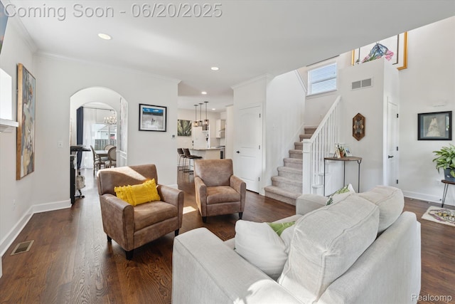 1920 Rowland Ave, Royal Oak, MI 48067 - living area featuring arched walkways, stairs, dark wood-type flooring, recessed lighting, and ornamental molding