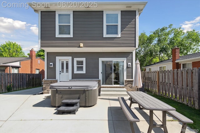 1920 Rowland Ave, Royal Oak, MI 48067 - rear view of property featuring a hot tub and a patio