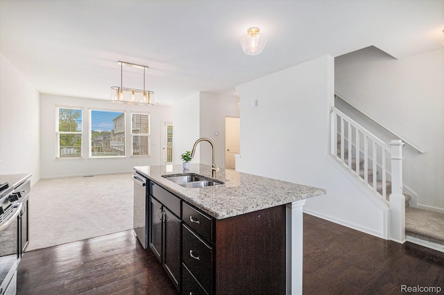 478 N Wixom Rd, Wixom, MI 48393 - kitchen with dark wood finished floors, appliances with stainless steel finishes, open floor plan, and light stone counters