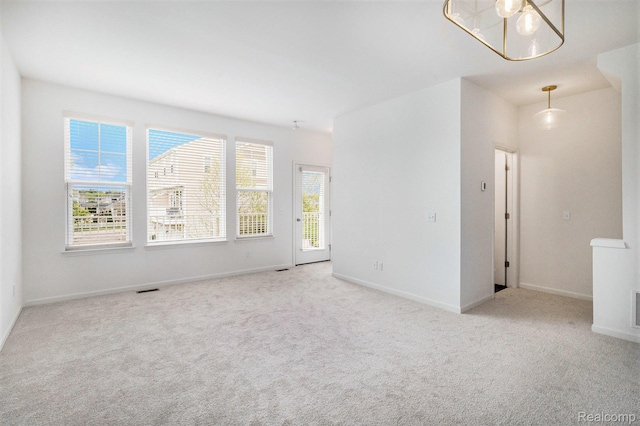 478 N Wixom Rd, Wixom, MI 48393 - carpeted empty room with baseboards