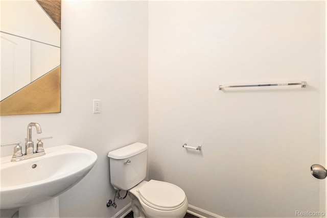 478 N Wixom Rd, Wixom, MI 48393 - bathroom featuring a sink and toilet