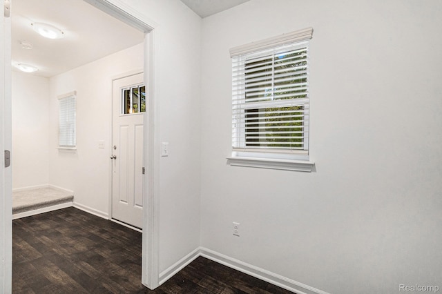 478 N Wixom Rd, Wixom, MI 48393 - entrance foyer featuring dark wood-type flooring and baseboards