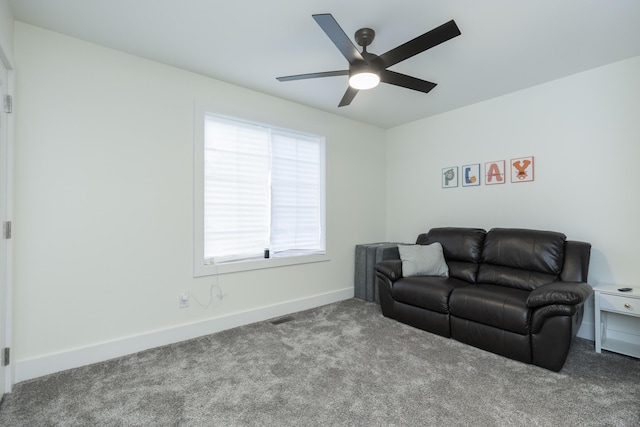 21536 Fieldview Dr, Edwardsburg, MI 49112 - carpeted living area with a ceiling fan and baseboards
