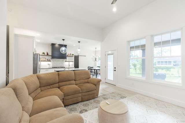 21536 Fieldview Dr, Edwardsburg, MI 49112 - living area with light wood-style floors, ceiling fan, and recessed lighting