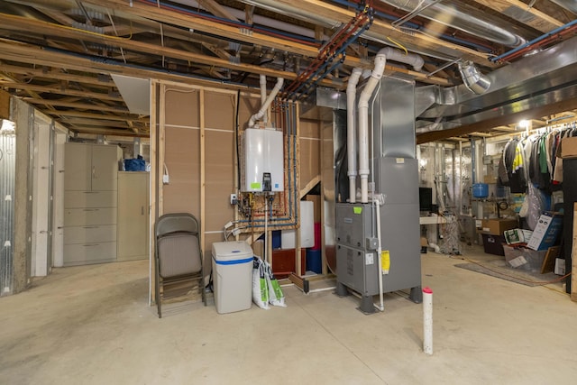 21536 Fieldview Dr, Edwardsburg, MI 49112 - unfinished basement featuring water heater and heating unit