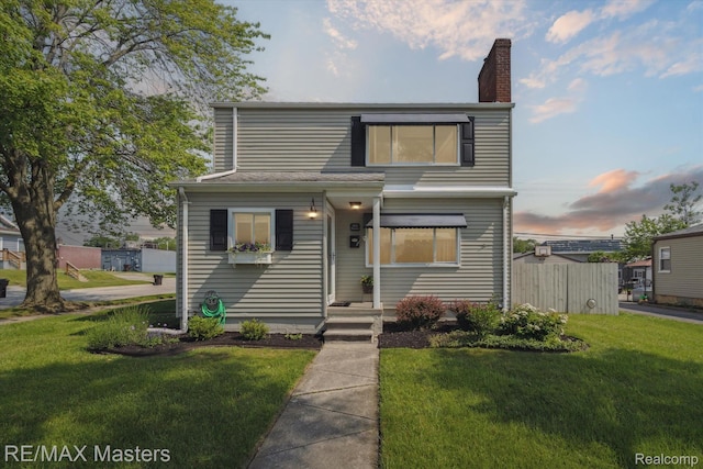 1972 Theodore St, Trenton, MI 48183 - traditional-style home with a chimney