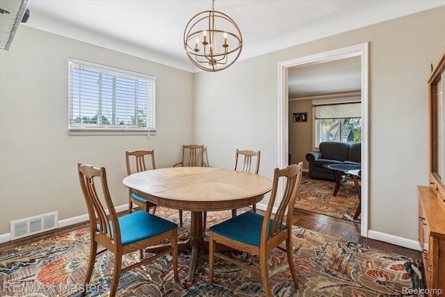 1972 Theodore St, Trenton, MI 48183 - dining area with a chandelier and baseboards
