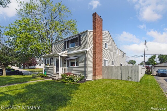1972 Theodore St, Trenton, MI 48183 - view of front of property with a chimney