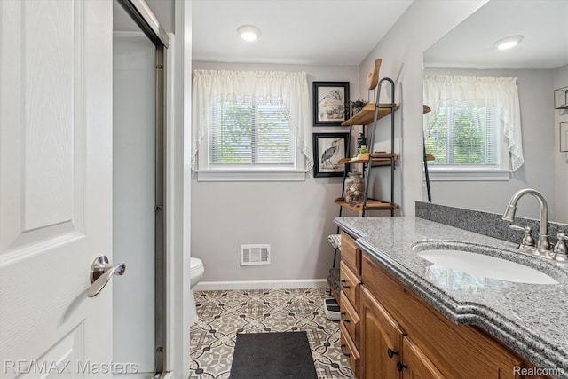 1972 Theodore St, Trenton, MI 48183 - bathroom with plenty of natural light, vanity, and tile patterned floors