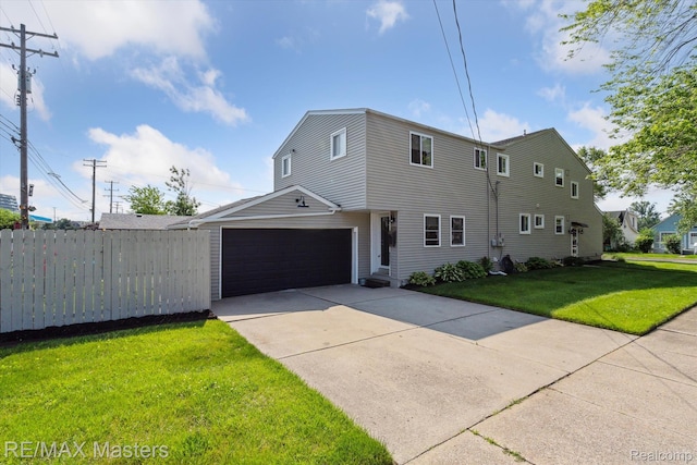 1972 Theodore St, Trenton, MI 48183 - view of front of home featuring concrete driveway and an attached garage