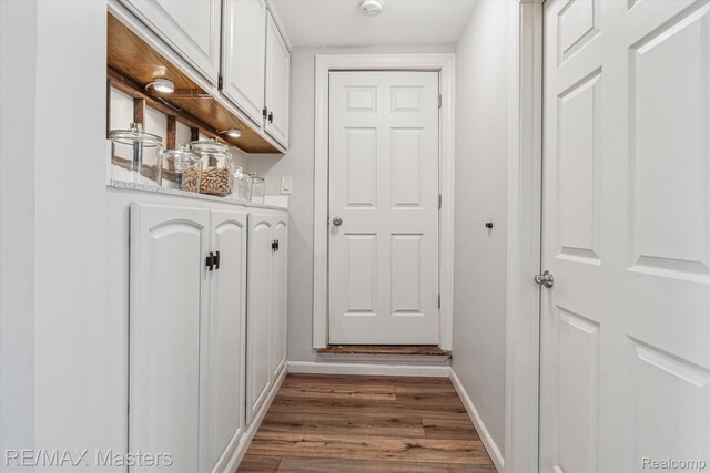 1972 Theodore St, Trenton, MI 48183 - corridor featuring wood finished floors and baseboards