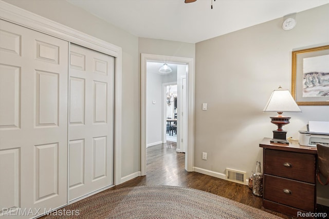 1972 Theodore St, Trenton, MI 48183 - bedroom with dark wood-style flooring, a closet, and a ceiling fan