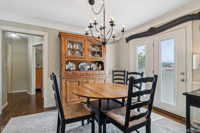 1972 Theodore St, Trenton, MI 48183 - dining space with a chandelier and dark wood-style flooring