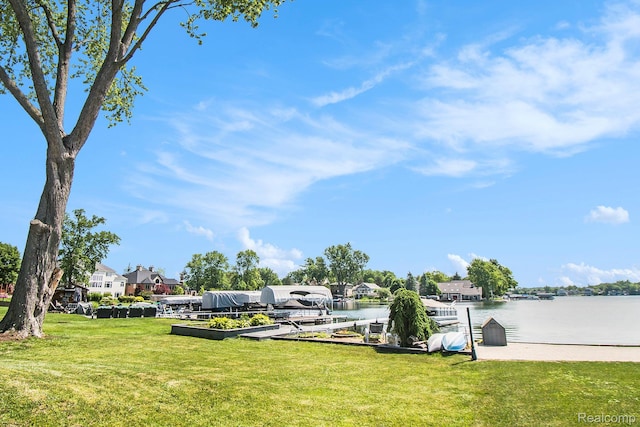 11501 Torrey Rd, Fenton, MI 48430 - dock area with a yard and a water view