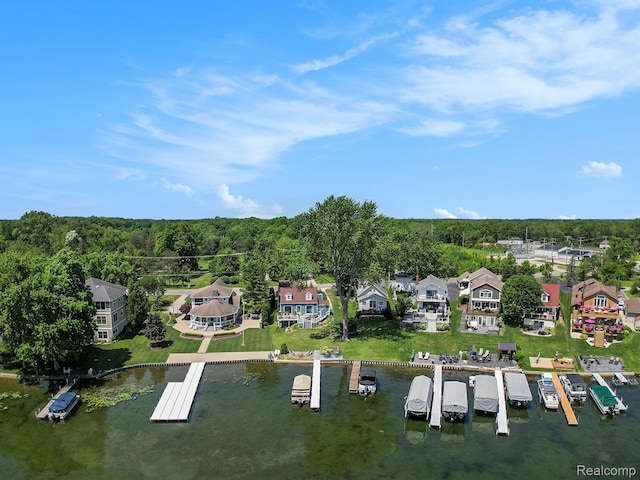 11501 Torrey Rd, Fenton, MI 48430 - aerial overview of property's location with a forest and a nearby body of water