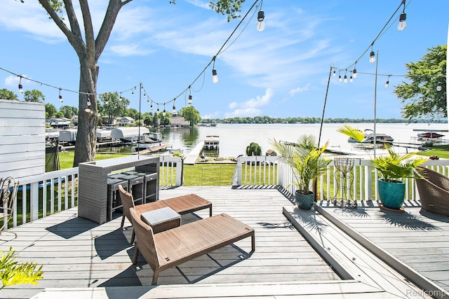 11501 Torrey Rd, Fenton, MI 48430 - deck featuring a water view, a yard, and a dock