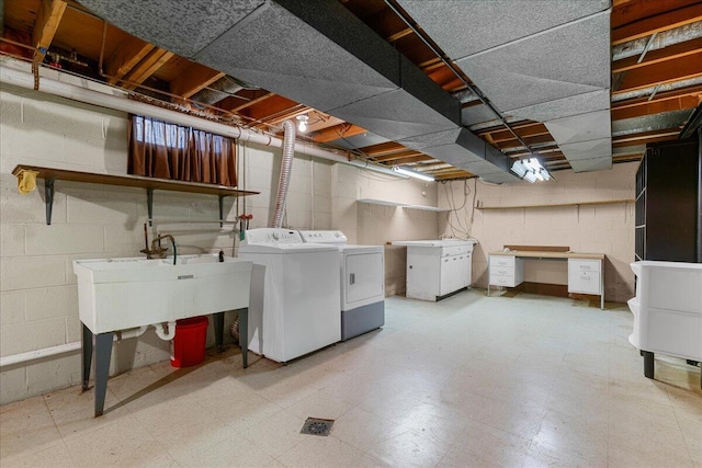 360 Wood Creek Dr, Howell, MI 48843 - unfinished below grade area with separate washer and dryer, light flooring, and concrete block wall