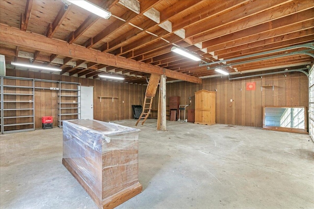 360 Wood Creek Dr, Howell, MI 48843 - below grade area featuring wooden walls