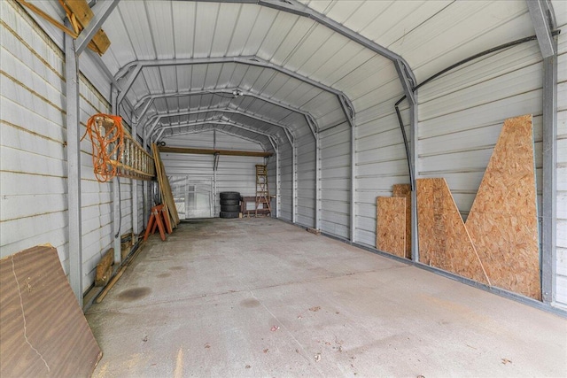 360 Wood Creek Dr, Howell, MI 48843 - garage with a carport