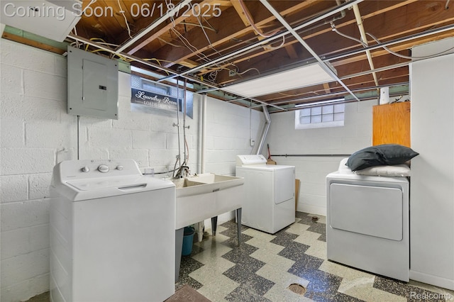 19045 Morningside Ave, Eastpointe, MI 48021 - washroom featuring electric panel, washing machine and clothes dryer, and light floors
