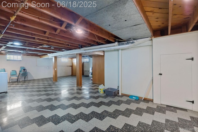 19045 Morningside Ave, Eastpointe, MI 48021 - below grade area with tile patterned floors and washing machine and clothes dryer