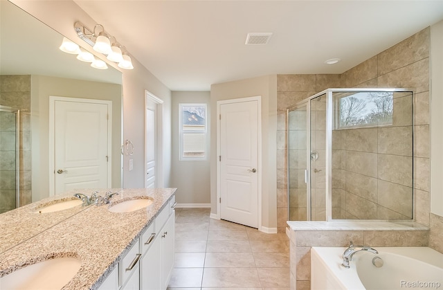 6227 Marsh, Ypsilanti, MI 48197 - full bathroom with double vanity, a stall shower, a bath, and tile patterned floors
