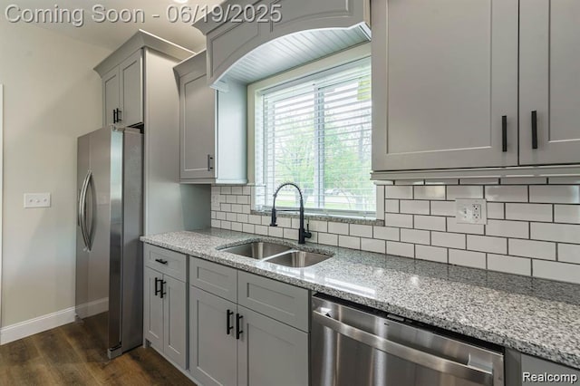 23013 Helen, Southfield, MI 48033 - kitchen with stainless steel appliances, dark wood finished floors, backsplash, light stone counters, and gray cabinets