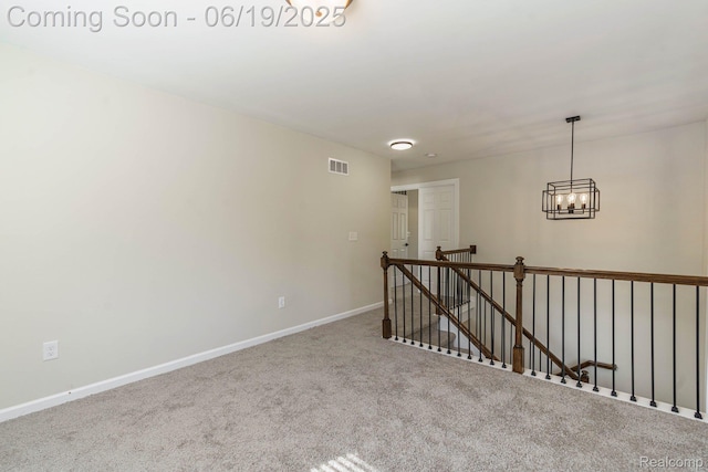 23013 Helen, Southfield, MI 48033 - empty room featuring carpet floors and a chandelier