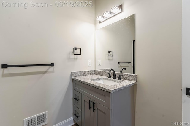 23013 Helen, Southfield, MI 48033 - bathroom with vanity and baseboards