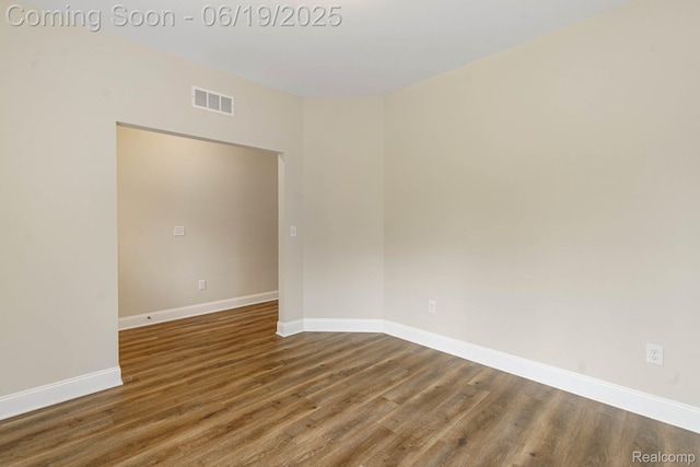 23013 Helen, Southfield, MI 48033 - empty room with wood finished floors and baseboards
