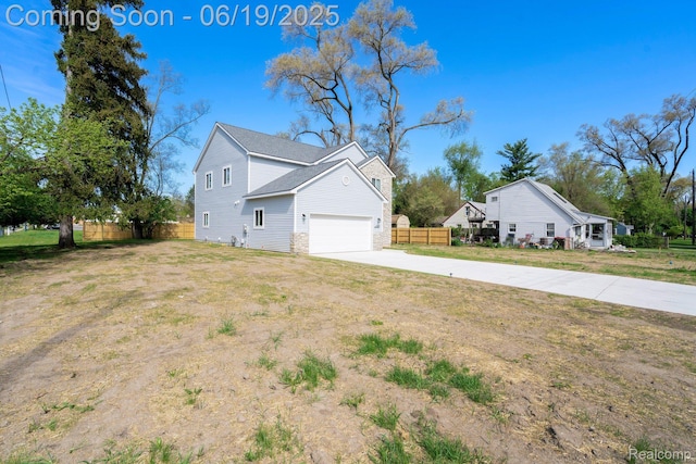 23013 Helen, Southfield, MI 48033 - view of side of home with driveway and a garage
