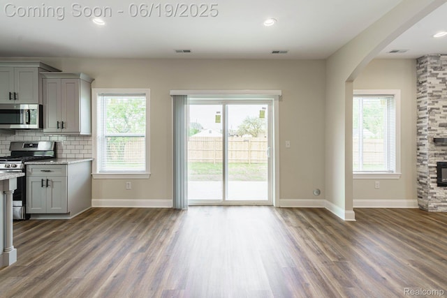 23013 Helen, Southfield, MI 48033 - kitchen with appliances with stainless steel finishes, gray cabinetry, plenty of natural light, wood finished floors, and recessed lighting