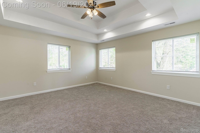23013 Helen, Southfield, MI 48033 - carpeted empty room featuring a tray ceiling, ceiling fan, and recessed lighting