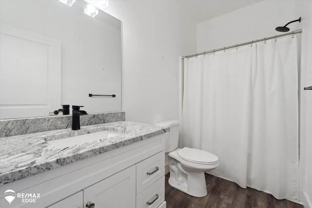 3113 Harbor Pointe Cir, Fenton, MI 48430 - bathroom featuring vanity, wood finished floors, and curtained shower
