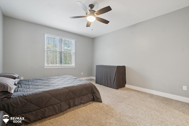 3113 Harbor Pointe Cir, Fenton, MI 48430 - carpeted bedroom featuring baseboards and a ceiling fan