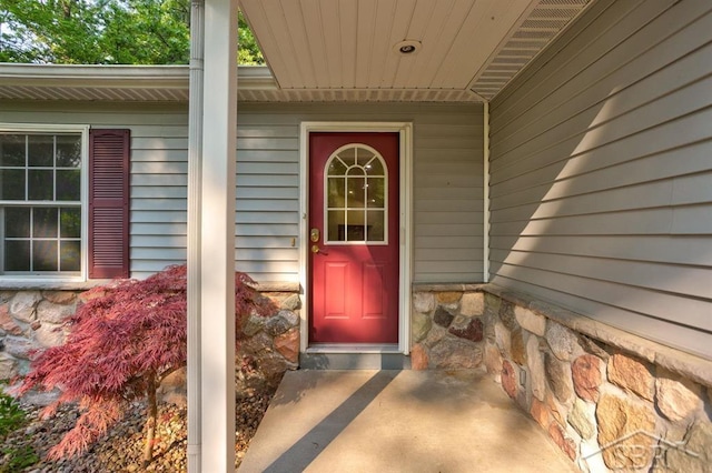 878 S Crooked Tree Ln, Midland, MI 48640 - entrance to property featuring stone siding